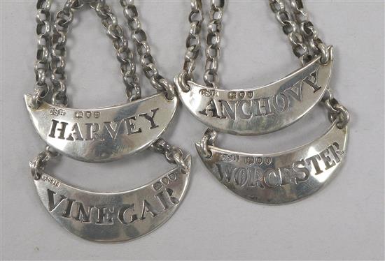 A set of 4 Victorian silver sauce labels by Charles Stuart Harris